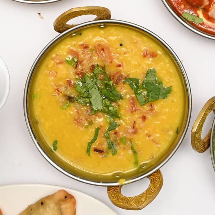 Tarka daal with crispy onions and coriander